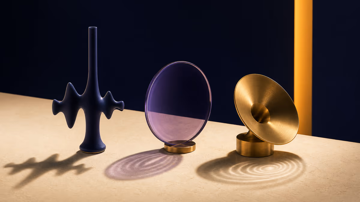 Three sculptural speaking instruments casting distinct signal-shaped shadows